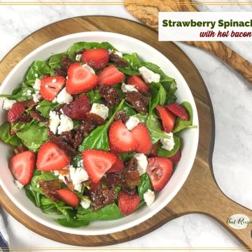 spinach and strawberry salad with text overlay "strawberry spinach salad with hot bacon dressing"