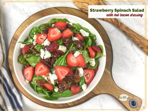 spinach and strawberry salad with text overlay "strawberry spinach salad with hot bacon dressing"