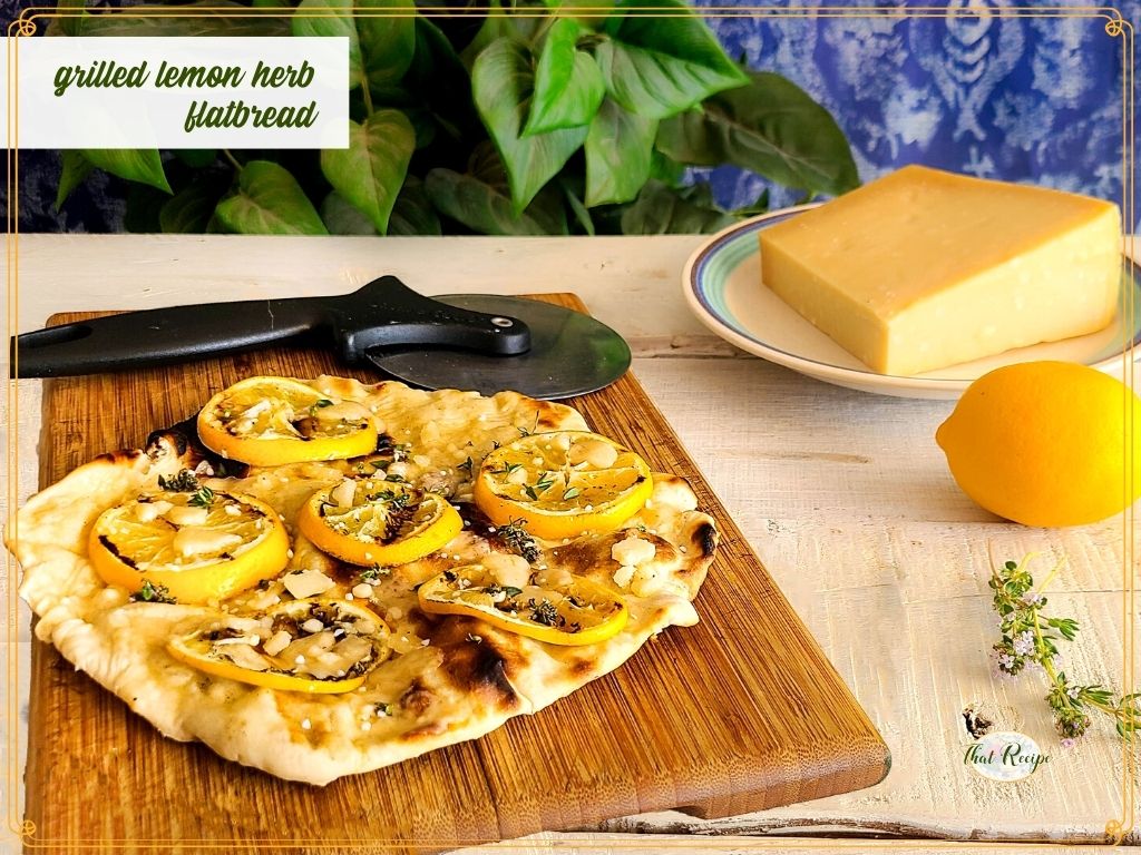 flatbread with grilled lemon slices and text overlay "grilled lemon herb flatbread"