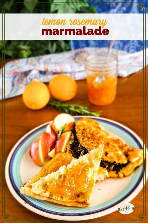 toast on a plate with an omelet and apples and text overlay "lemon rosemary marmalade"