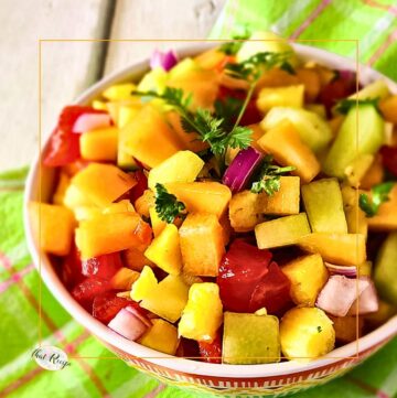 melon pineapple fruit salad in a bowl