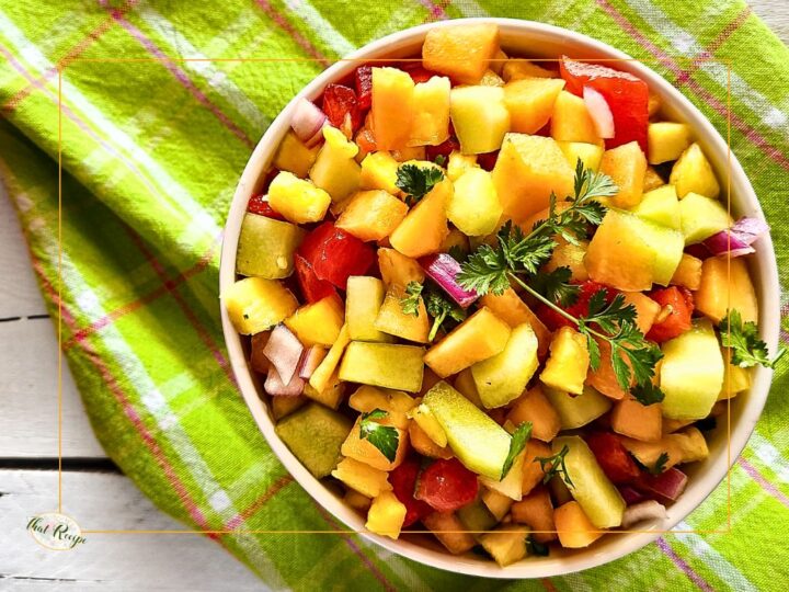 melon pineapple fruit salad in a bowl