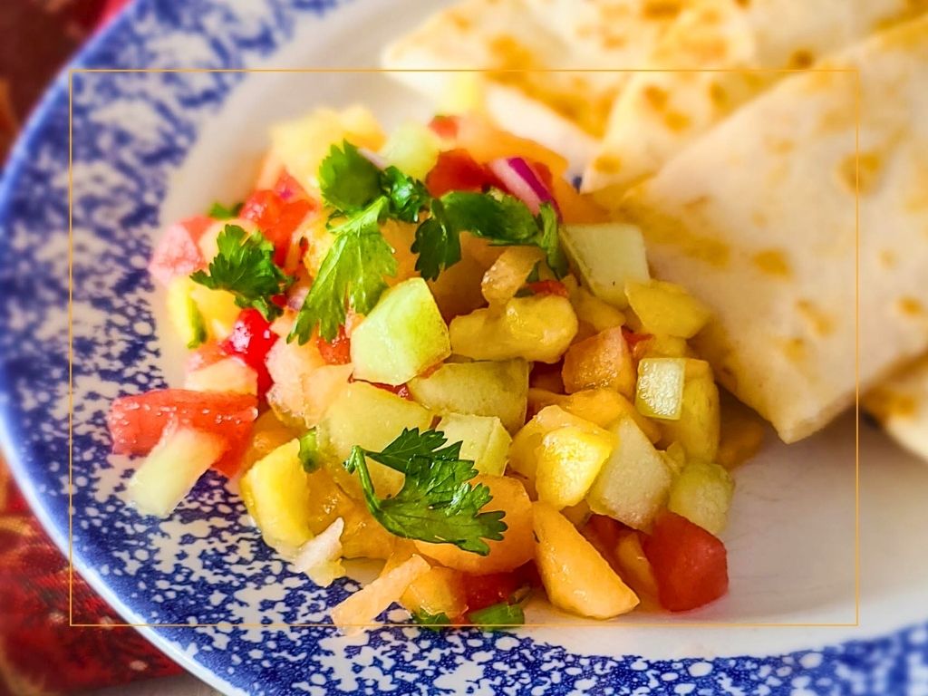 melon pineapple salsa on a plate