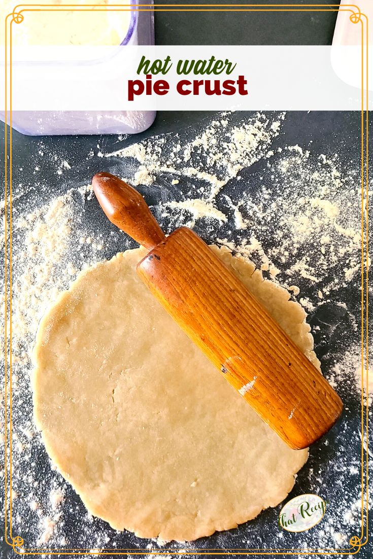 pie dough rolled out on a counter with text overlay "hot water pie crust"