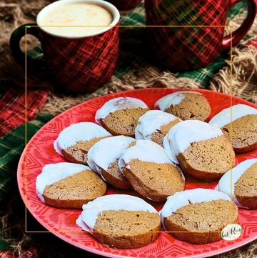 cookies dipped in white chocolate on a plate