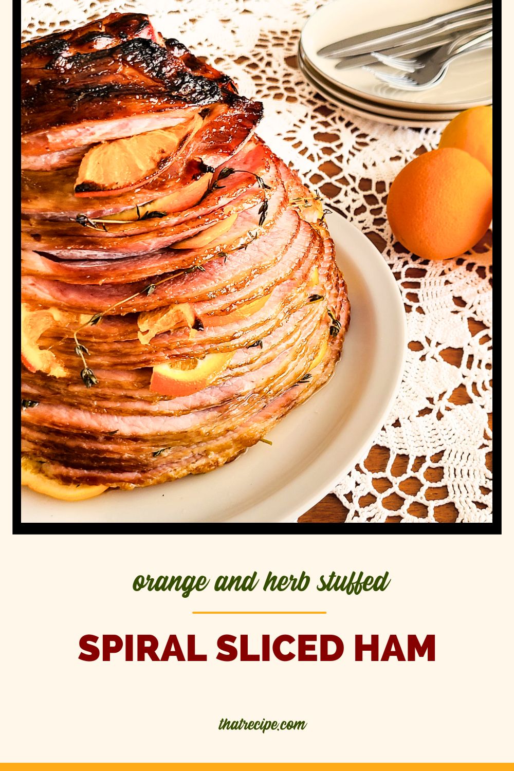 Spiral sliced ham on a plate with text overlay "orange stuffed spiral sliced ham"