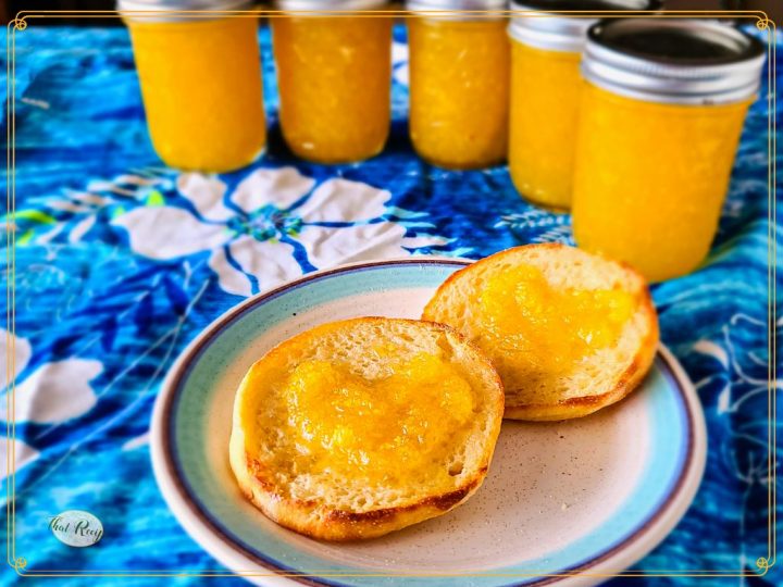 mango freezer jam on an English muffin with text overlay