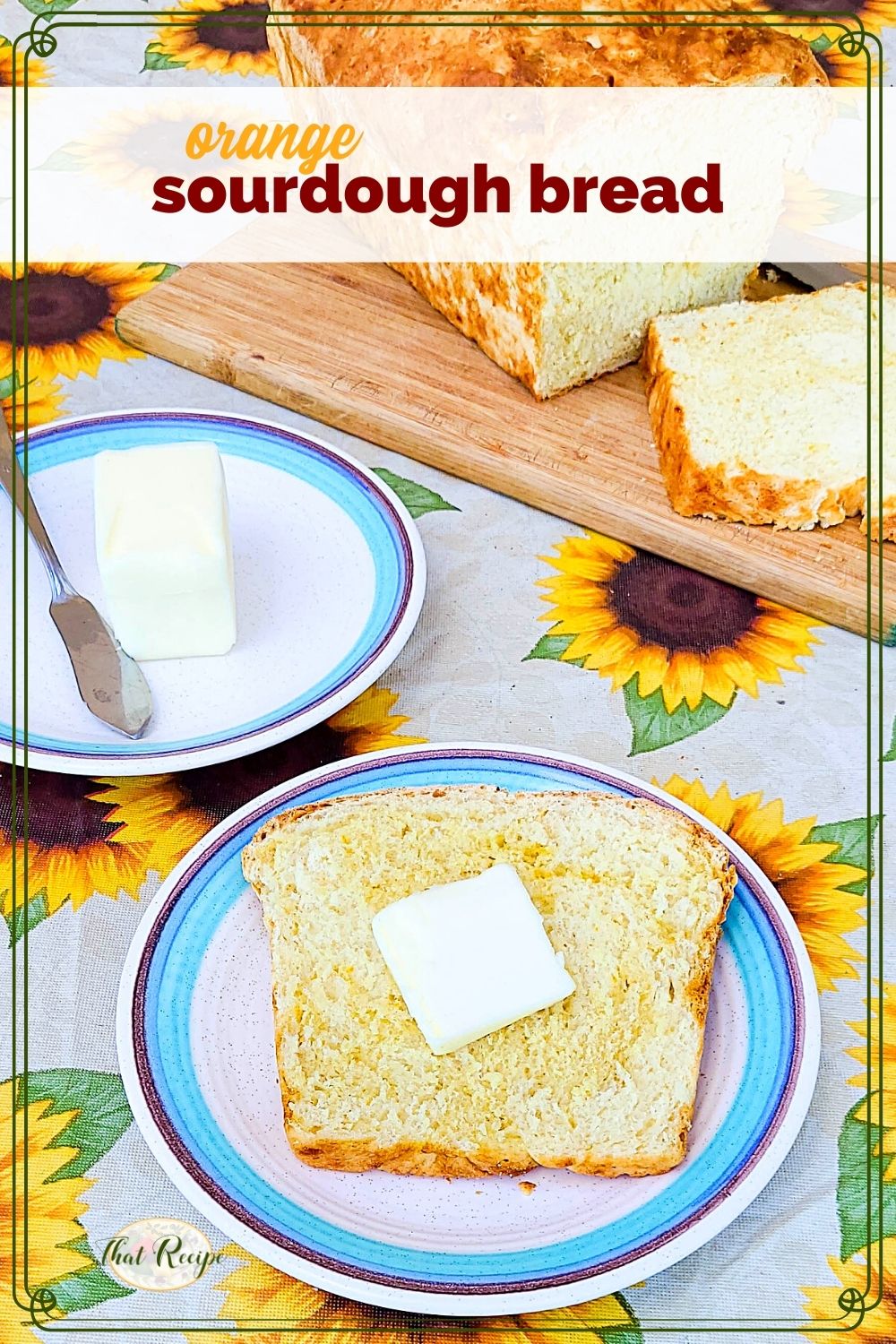 Slice of orange casserole bread with butter with text overlay "sourdough orange bread"