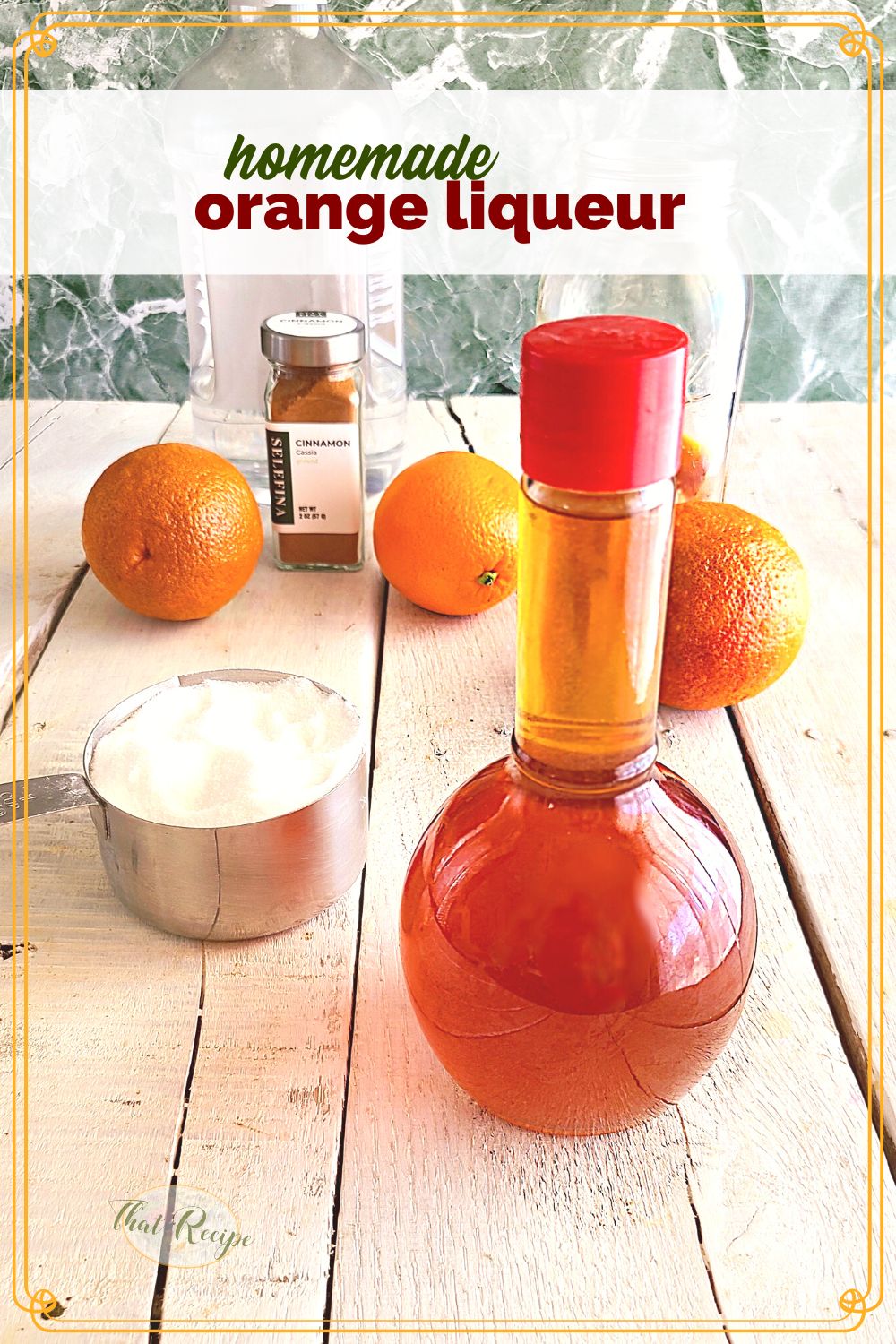 bottle of orange liqueur with ingredients