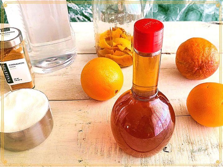 bottle of orange liqueur with ingredients