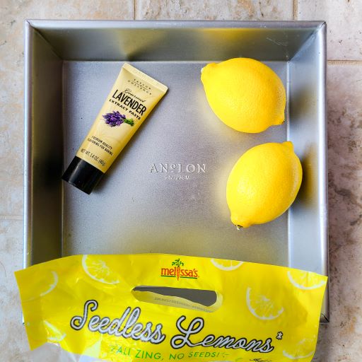 lemons and lavender extract in a square baking pan