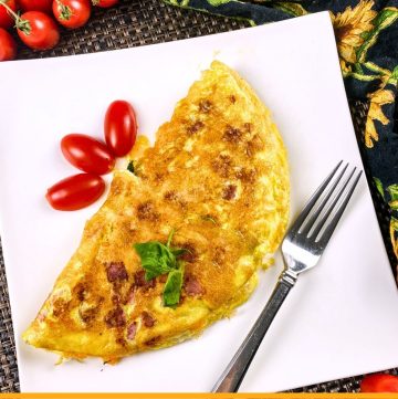Ham and cheese omelet on a plate