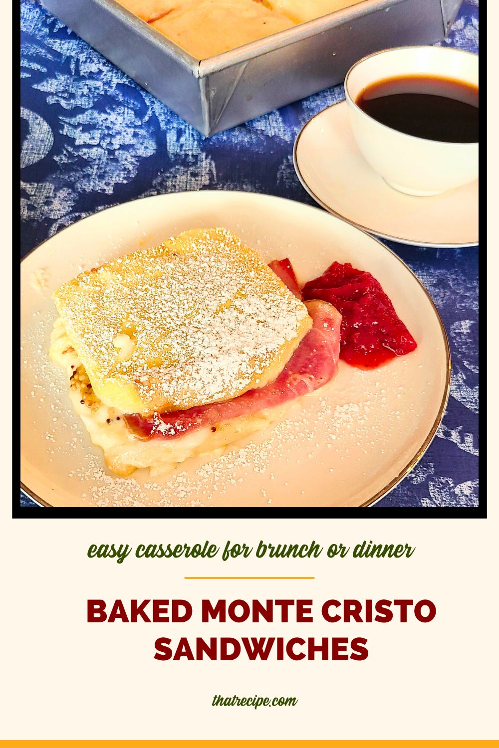 Monte Cristo Sandwich covered in powdered sugar with strawberry jam