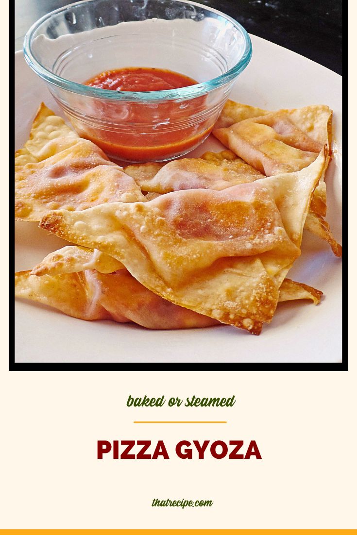 baked wontons on a plate with marinara sauce and text overlay "baked pizza gyoza"