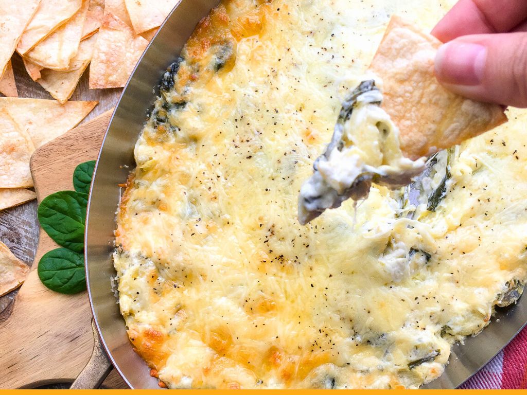 hot spinach artichoke dip with tortilla chips