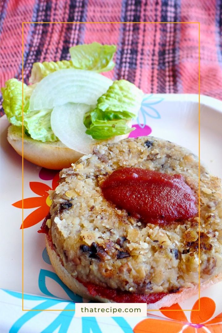 vegetarian burger on a bun topped with barbecue sauce