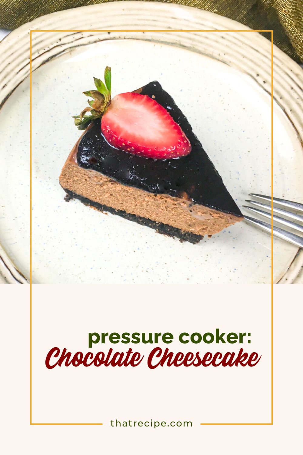 Chocolate cheesecake with chocolate topping and fresh strawberry slice