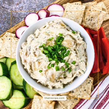 caramelized onion dip with crackers and vegetables