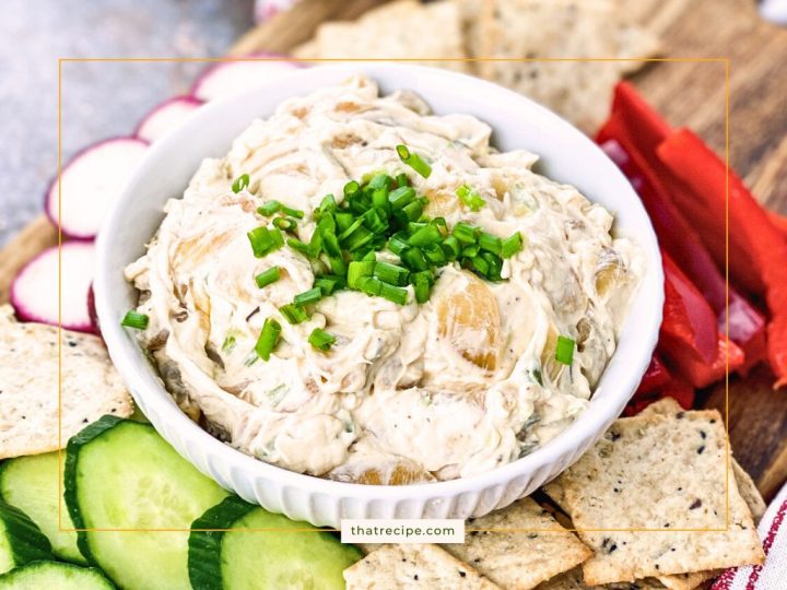 caramelized onion dip with crackers and vegetables