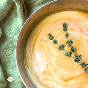 creamy ginger carrot soup in a pot