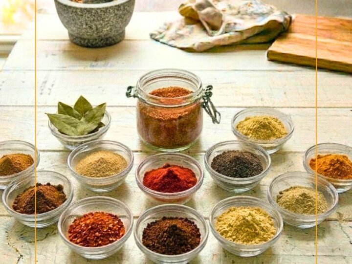 spices in bowls and jars on a table
