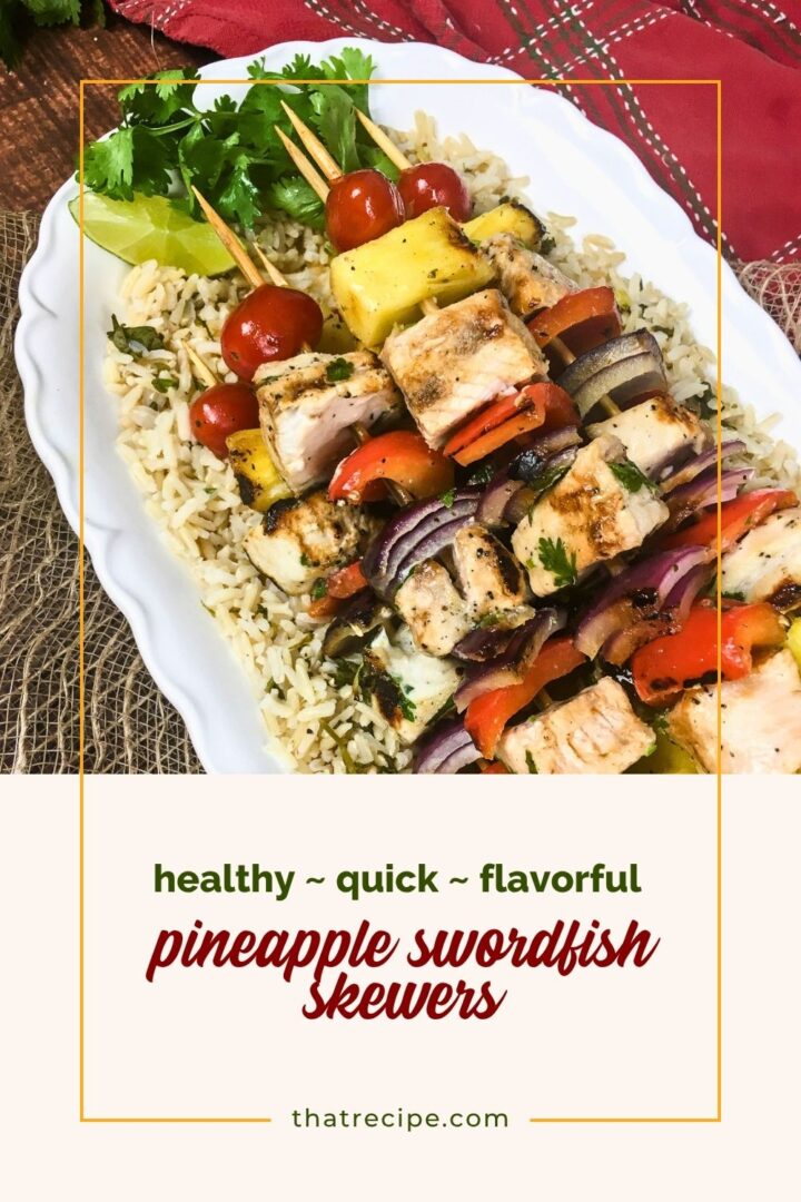 pineapple and swordfish skewers on bed of rice