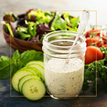 ranch dressing in a jar with a salad