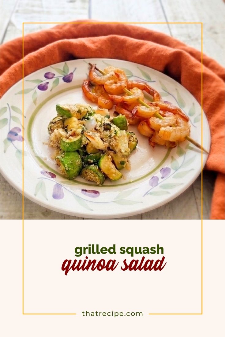 Summer Squash and Quinoa Pilaf or Salad on a plate with shrimp skewers.