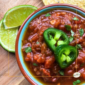 bowl of salsa topped with jalapeno slices